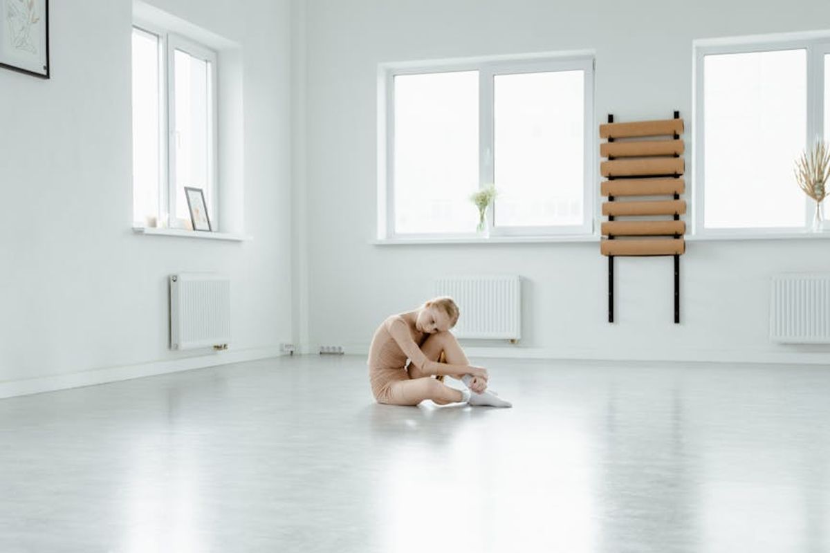 Minimalist yoga studio with white walls and natural light